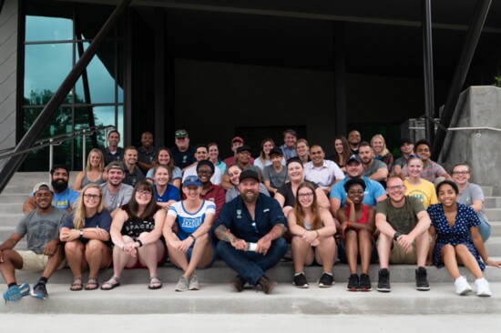 Zac Brown and camp counselors on the activity center steps