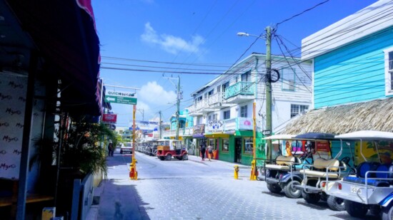 Front street lined with golf carts is an everyday sight in San Pedro.