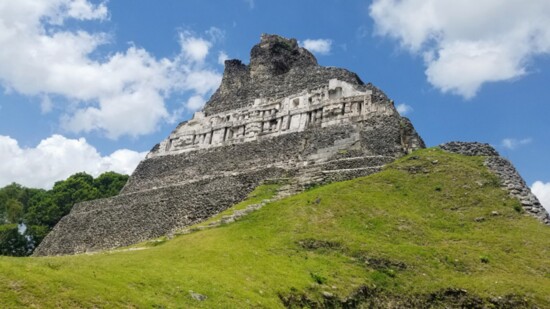 Mayan pyramid ruin 'El Castillo' with carvings at the archeological site Xunantunich near San Ignacio, Belize.