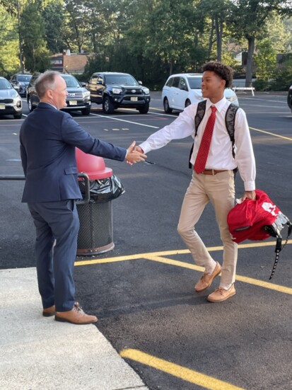 BC President Dr. Brian Mahoney greeting freshmen on their first day of school