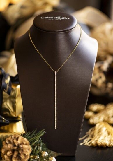 Talk about raising the bar! This 14k yellow gold Long Diamond Bar Pendant Necklace from Gabriel & Co. (0.95ct total weight) elongates and electrifies a dramatic