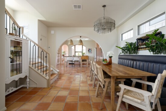 An arched doorway, high-set windows and beautiful Saltillo tiles are among the features that make this a standout kitchen. 