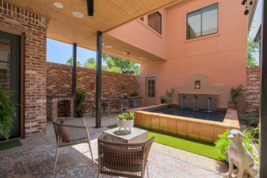 Outdoor living at its best. A cocktail pool serves as the centerpiece of this spacious courtyard.