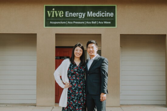 Daniel and Olivia Kim in front of the Vive Energy Medicine storefront.