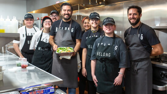 Chef Aaron Bludorn trains Belong Kitchen employees during the Guest Chef series.