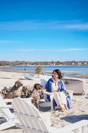 Dr. Clukey loves spending time on the beach with her dogs Charlie and Kia