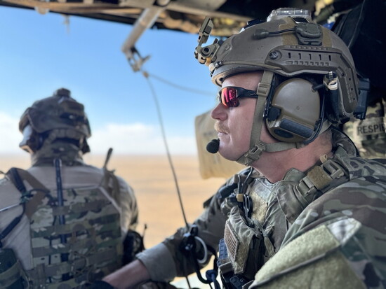 Kyle during a High Altitude Low Opening parachute jump in the Middle East in 2011