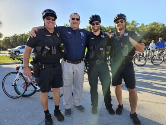 At a “Bike Ride with the Mayor” event, L-R: Hammett, Mayor Nick Pachotta, Detective Korey Shope, and Detective Conner Jones.