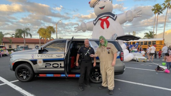 Hammett, Officer Bill Long and “Ghostbusters” Stay Puft Man at Epiphany Cathedral School’s “Trunk or Treat” Halloween event.