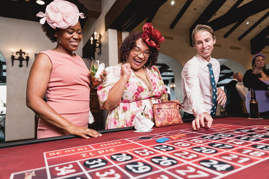Parents ante up for a good cause at Westerly's "Run for the Roses Derby Soiree" — the school's annual auction fundraiser.