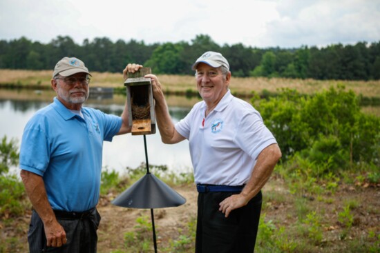 Glen Hendry and Mike DeBruhl monitoring the bluebird boxes at the Reserve Club.