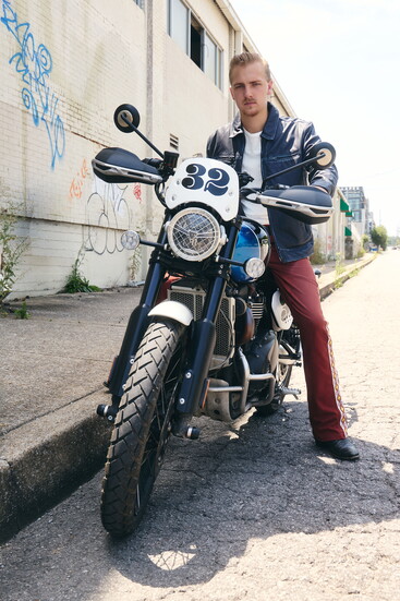 Blue Leather Jacket: John Varvatos | White Tee: Nudie Jeans | Bellbottoms: United Rivers