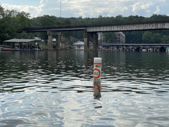 When boating, pay attention to speed and wake buoys. 