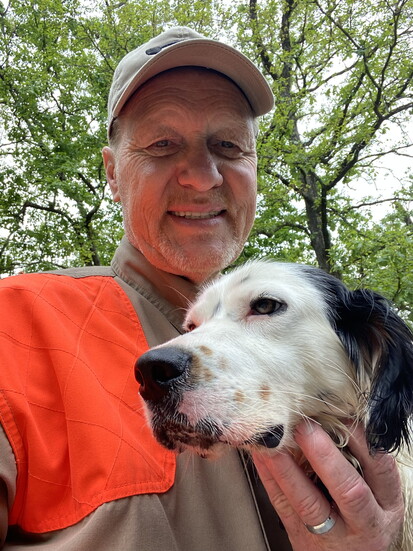 Rick Earwood with his Brittany Spaniel, Doc