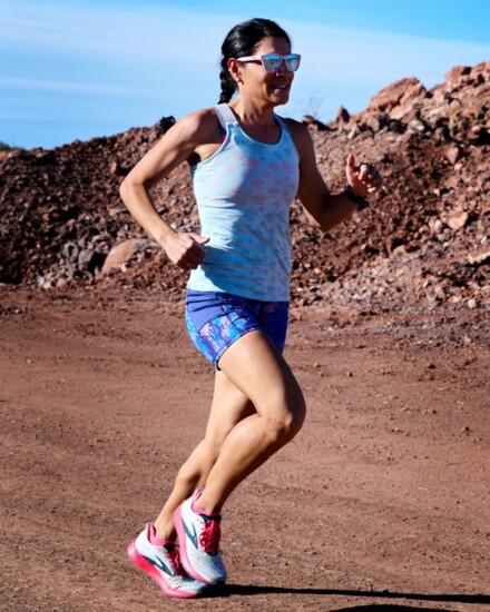 Gina Sando studied the science behind running to help create a training regimen