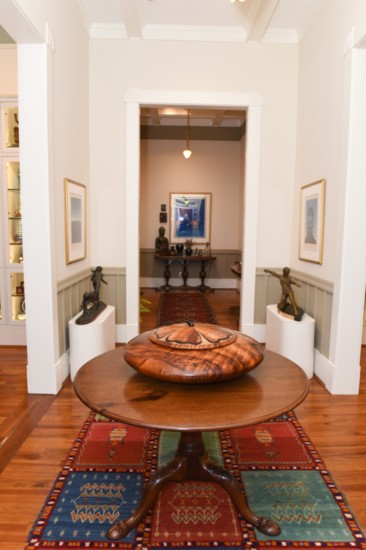 Entryway features Hibiscus Bowl by Robert W. Butts, made of Koa wood unique to Hawaii