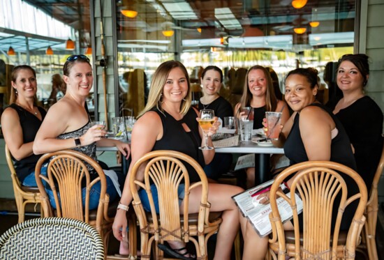 Suz and several ladies having dinner with the 80/20 rule- you do not have to be perfect, to be healthy. Photo by Tia Reman.