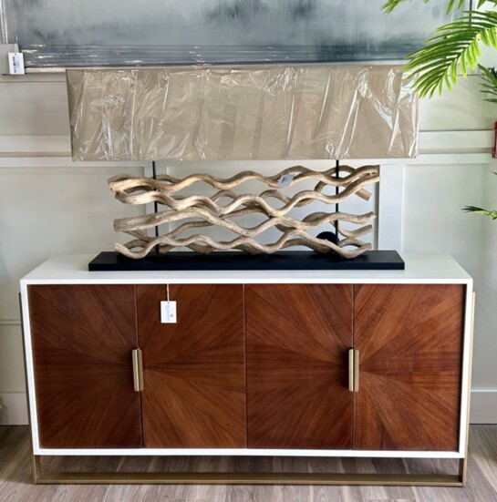 This fantastic driftwood lamp on top of this beautiful textured wood credenza exemplifies Coastal Style!
