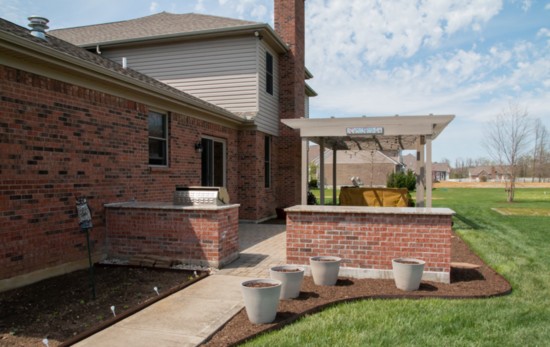 Finer Lawn's handiwork can be seen on this patio with built-in barbecue and pergola at Tony Sottile's house. 