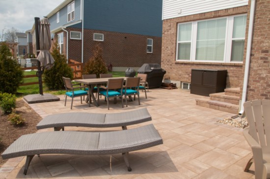 Finer Lawn built the patio, fire pit and stairs in our own publisher's backyard. 