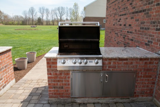 Finer Lawn's handiwork can be seen on this patio with built-in barbecue and pergola at Tony Sottile's house. 