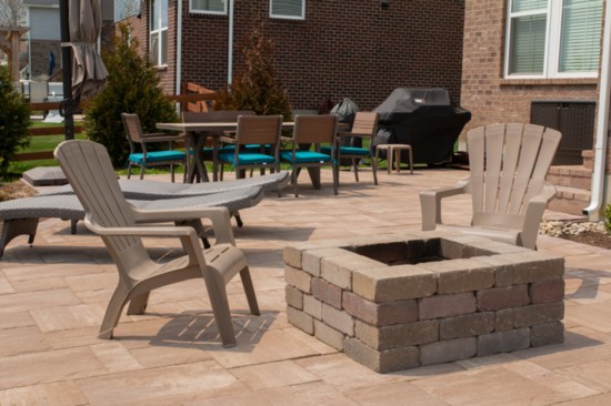 Finer Lawn built the patio, fire pit and stairs in our own publisher's backyard. 