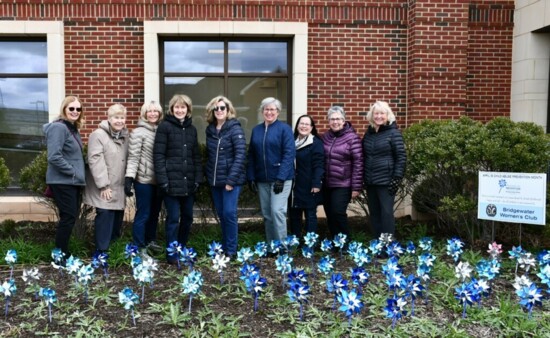 Club members “plant” a pinwheel garden in support of PCA-NJ and Children Abuse Prevention Month. 