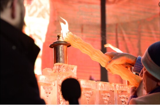 Lighting the menorah at Fire on Ice