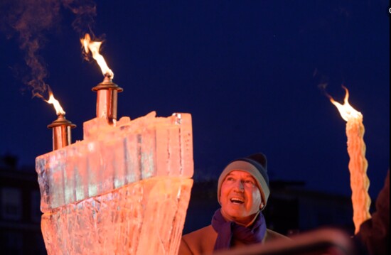 Lighting the menorah at Fire on Ice