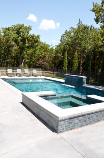 The specially-designed swimming pool is a standout feature of the home.