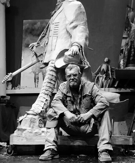 Sculptor Craig Campobella takes a break in his studio.
