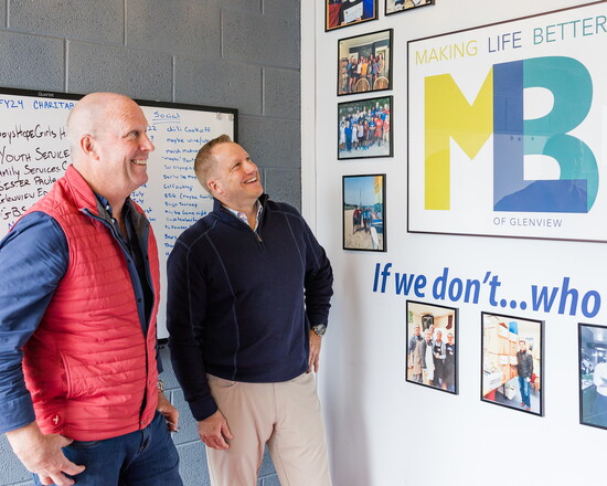 TJ Marriott, vice president of philanthropy, and President Kevin Kachmarik look at 