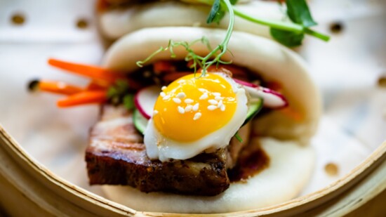 Traveler’s Table, Pork Belly Breakfast Bao. Photo by Kirsten Gilliam