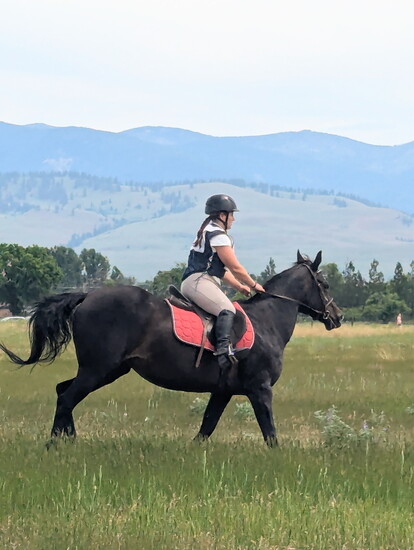 Alycia Nortz riding Midnight