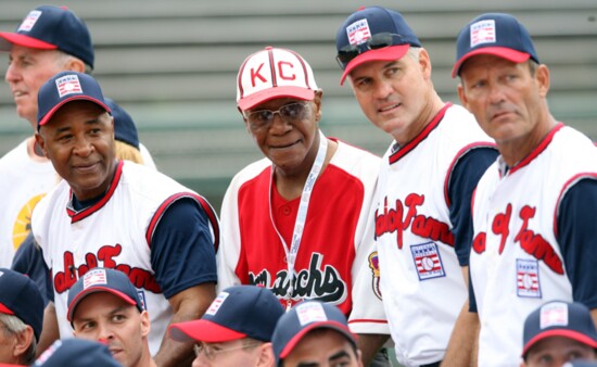 Buck O’Neil with HOF members Ozzie Smith (l), George Brett (r), and Ryan Sandberg Cooperstown 2006