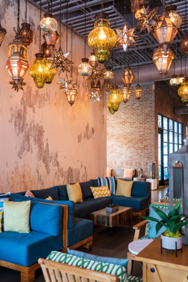 Sitting area illuminated by an assortment of gorgeous lanterns