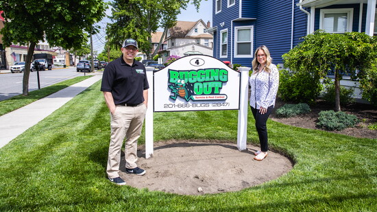 Luigi and Toni Ann Migilore outside of Bugging Out's Office Building
