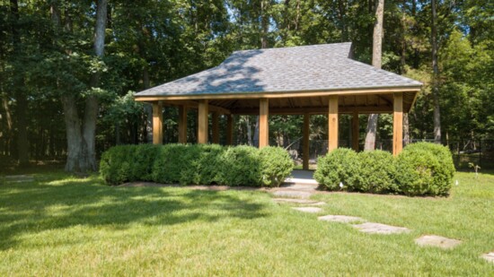 Rustic pavilion at the edge of the woods for larger gatherings away from the pool area