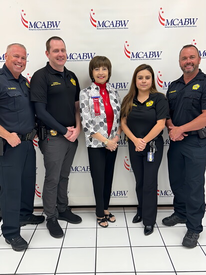 Carol with Gabe and his team.