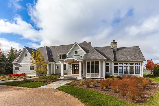 A gorgeous lakeside home built by Johnson Brothers Construction in Empire, Mich. Photo by Jeff Garland Photography.