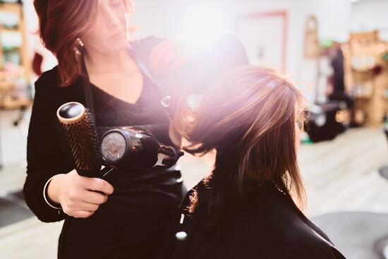 “I wanted a true team culture—stylists helping stylists, clients feeling at ease, and everyone supporting each other.”