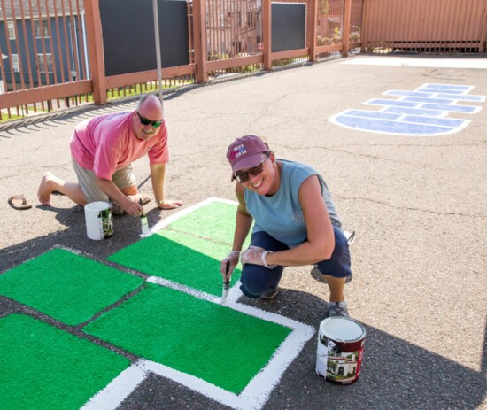 Members of the Rotary Club of Glastonbury volunteer at the Maria Sanchez School