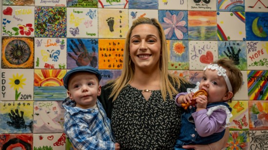 Alexis Travis and two of her children.