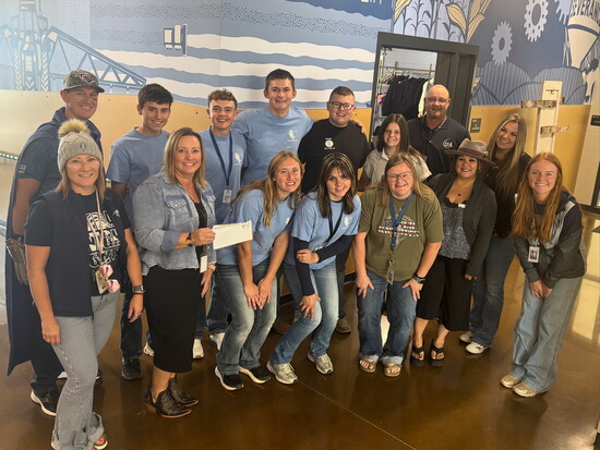 Weld RE-4 Education Foundation Board of Directors present a Teacher Grant Award to Mrs. Rice for the Agriculture program at Severance High School.
