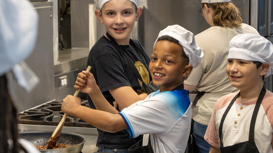 Students at Mountain View Elementary learn how to cook no-bake cookies with WHS students in the culinary lab, funded through a Student Grant Award.