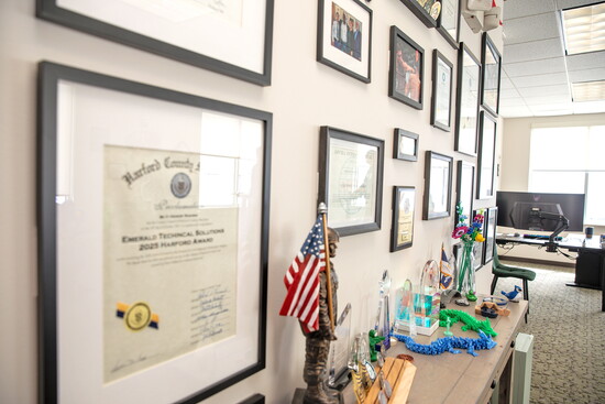 Awards and certificates at Emerald Technical Solutions/Defense Interns. Photo Credit: Kerry Paradis Photography