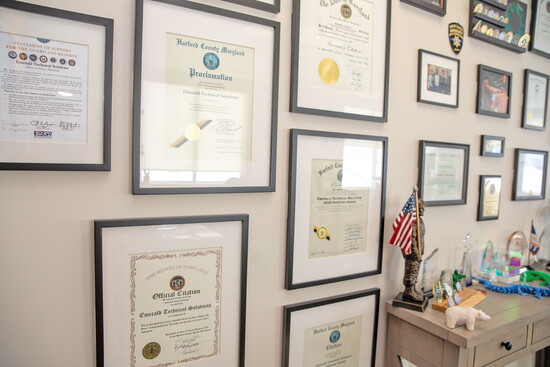 Awards and certificates at Emerald Technical Solutions/Defense Interns. Photo Credit: Kerry Paradis Photography
