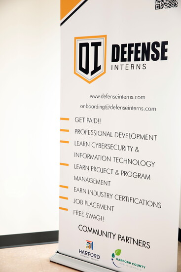 Defense Interns sign. Photo Credit: Kerry Paradis Photography