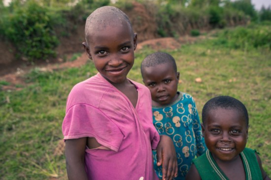 Children who live in government housing built for families of survivors of the genocide.