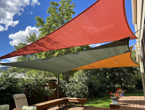 Custom sail shades by Peterson Canvas & Awning LLC bring layered shade and visual interest to outdoor spaces, balancing comfort with architectural harmony.